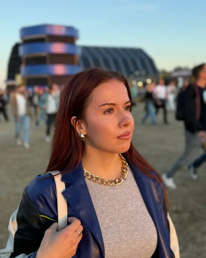 Ulia at a summer festival at golden hour